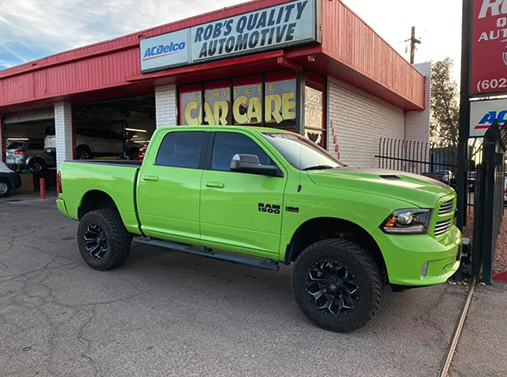 Lifted lime green Ram 1500 truck